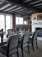 Dining room with exposed wooden beams