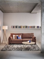Sofa in industrial open plan room