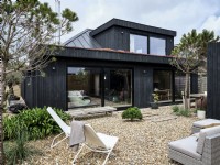 Black panelled bungalow