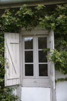 Detail of window shutters of rustic country home