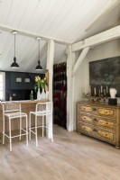 Modern country kitchen with antique chest of drawers
