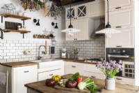 Modern country kitchen with vegetables on worktop