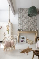 Swing chair in country childs bedroom