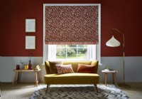 Living room with patterned roman blind