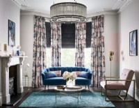 Living room with curtains and roman blinds