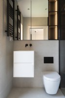 Modern bathroom with square sink unit and toiliet
