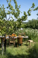 Rustic dining table in country garden