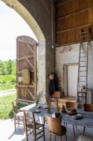 Rustic dining table in country barn home