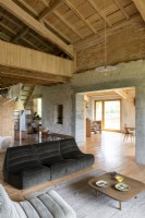 Open plan living space in converted barn