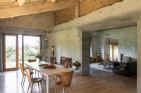 Dining area in open plan living space - converted barn