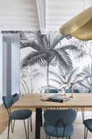 Modern dining room with bold patterened wallpaper