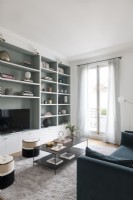 Modern living room with built-in shelving unit 