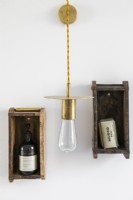 Tiny wooden wall mounted shelves and pendant light detail
