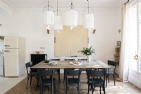 Dining area in neutrally decorated open plan living space