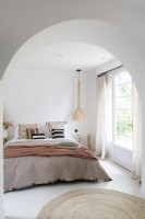 Country bedroom with French windows