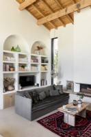 Modern living room with exposed wooden beams