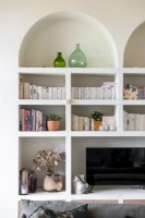 Built-in wall unit with alcove shelves