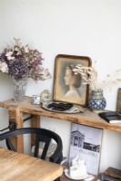Vintage painting and dried flowers