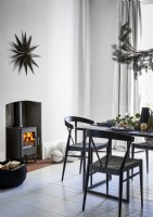 Wood burning stove in Christmas dining room