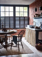 Traditional kitchen with black shutters