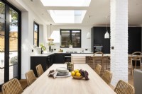 Classic modern kitchen with dining table.