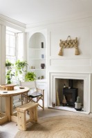 Modern classic living room with log burner.