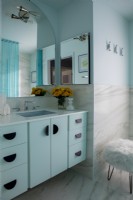 Modern bathroom in blue and white colours.