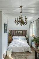 A bed in a cozy bedroom