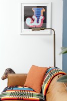 Detail of modern living room with bold, colourful accents