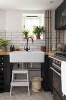Wheelchair accessible sink in Industrial style kitchen