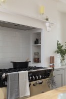 Traditional style range in shaker style kitchen