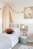 Childs bedroom with canopy tent and under bed storage drawer