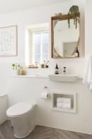 White tiled modern bathroom
