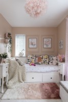 Girls bedroom with built in cabin bed with storage drawers underneath



