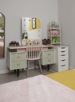 Bedroom detail showing upcycled dressing table.