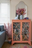 Living room detail showing upcycled drinks cabinet.