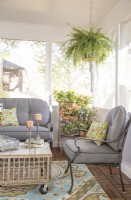 Detail of seating furniture in 3-season porch makeover