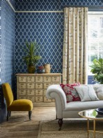 Living room with blue patterned wallpaper
