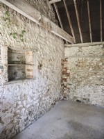 Interior of rustic stone stable
