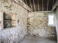 Interior of rustic stone stable