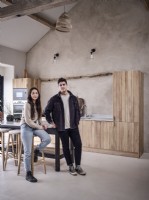 Portrait of homeowners Sophie and Rich Vermont in the Open plan Kitchen 