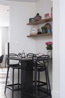 Black breakfast bar in contemporary apartment