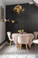 Vintage inspired dining corner with painted panelling
