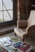 Chair by window in artists studio