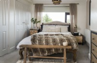 Neutrally decorated modern bedroom