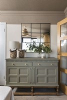 Sideboard and mirror in neutral colours