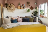 Large daybed covered in cushions