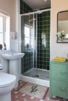 Modern bathroom - green tiling in shower cubicle