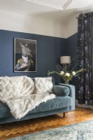Eclectic zebra painting on wall of a modern living room 