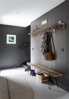 Contemporary hallway with coat hooks and bench seat